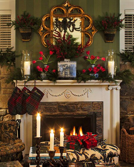 Christmas table with candlelight and evergreen garland