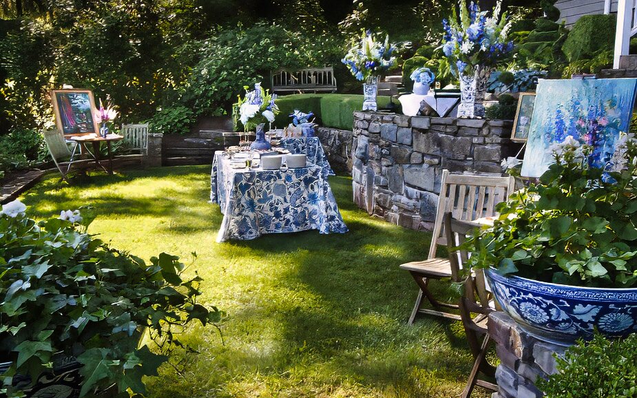 Summer outdoor tea setting in the cottage garden
